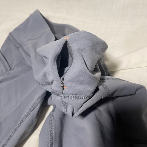 Athleta Capri Leggings. Zip pocket Mesh at leg bottoms. Athletic wear Sz Medium - Picture 3 of 7